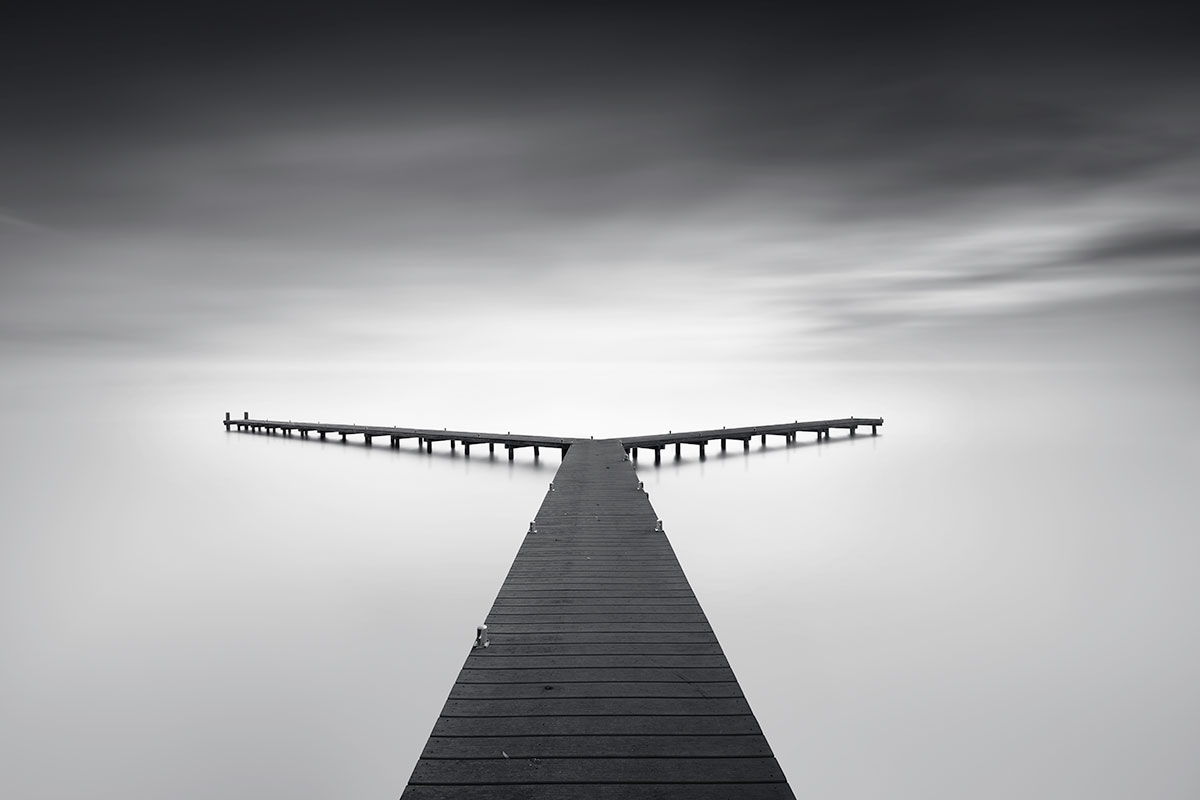 A jetty in the water of Uitgeest minimalism